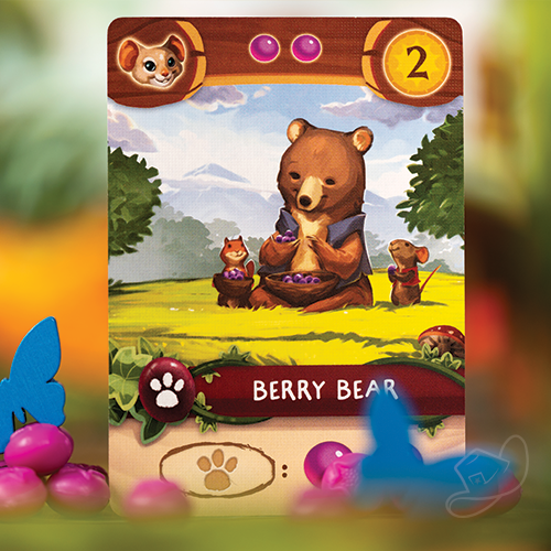 Berry Bear card featuring a cute cartoon bear with chip the squirrel and sweep the mouse.  Butterfly meeples and berry tokens in the foreground.