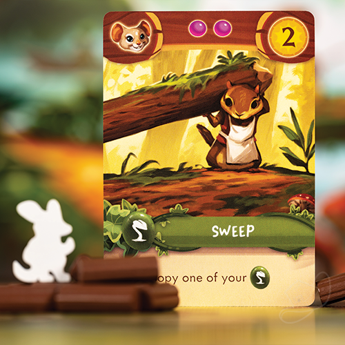 Sweep the mouse card from My Lil' Everdell highlighted with bunny meeple and twig tokens in the foreground.